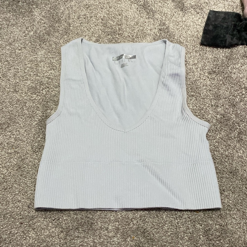 Low neck light blue tank top